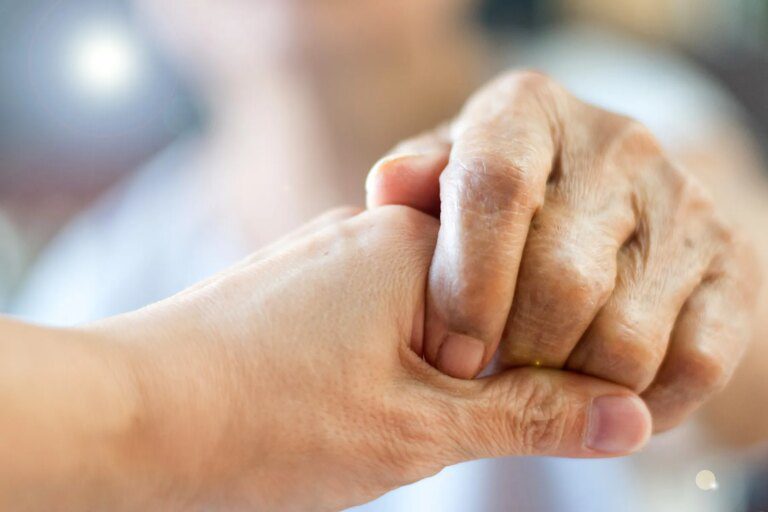 1800x1200 getty rf caregivers hand.jpg