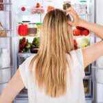Мифы и факты об отказе от глютена 1800x1200 woman looking in refrigerator.jpg