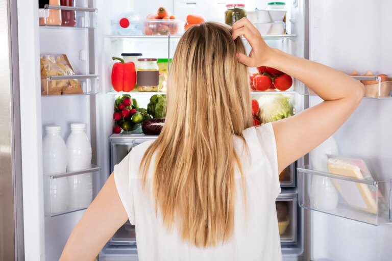 1800x1200 woman looking in refrigerator.jpg