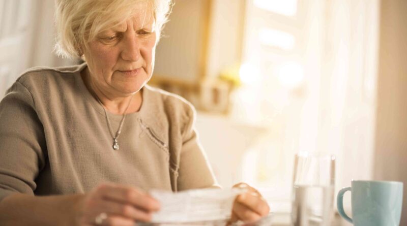 old woman reading instructions for a medicine 639794290 58af3e8d3df78cdcd8445bee.jpg